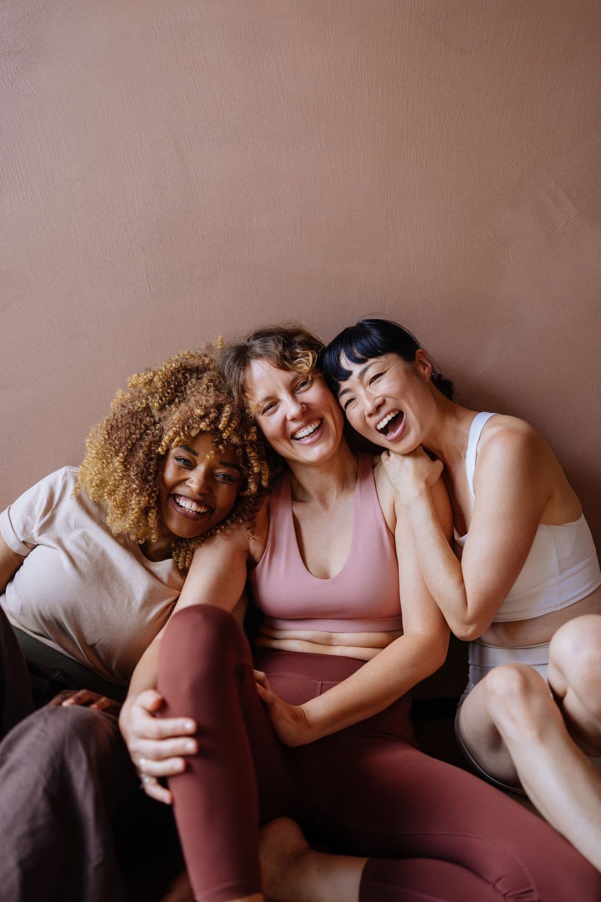 Women supporting each other on their wellness journey